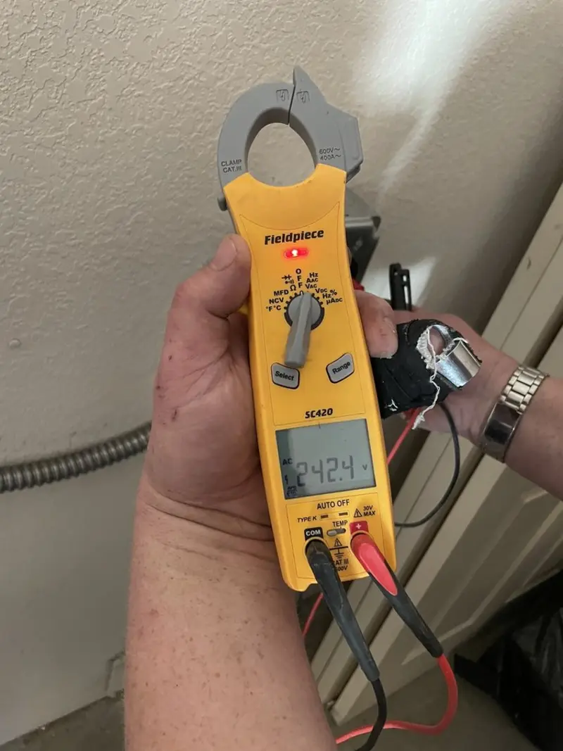 Voltage testing with clamp meter during Outlet Installation in Sun City Center